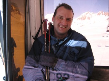 IMG_1180 Darrell looking remarkably cheery, sat next to an open gondola door in a howling gale